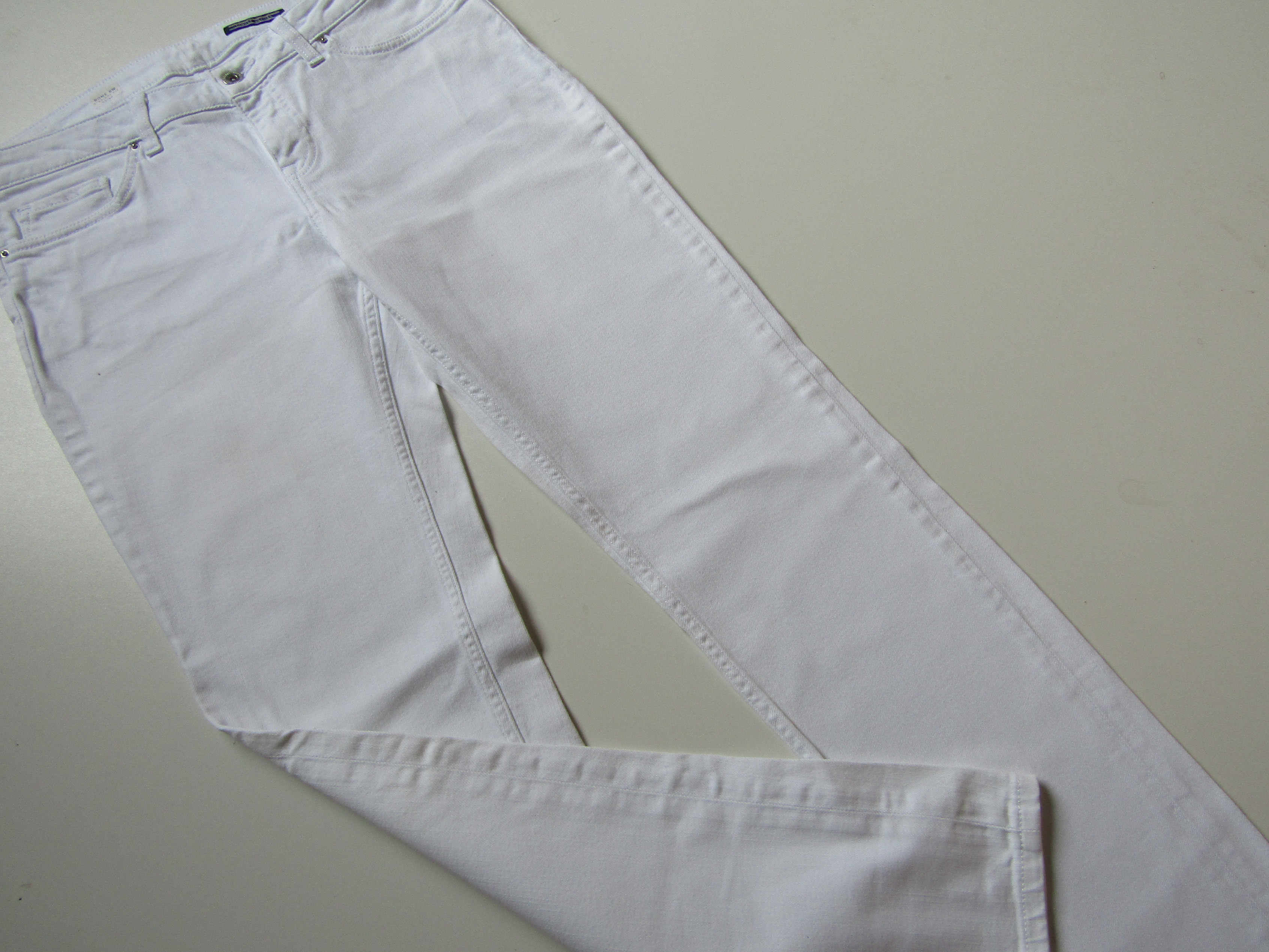 Dámské elastické džíny- TOMMY HILFIGER... VEL-32/32